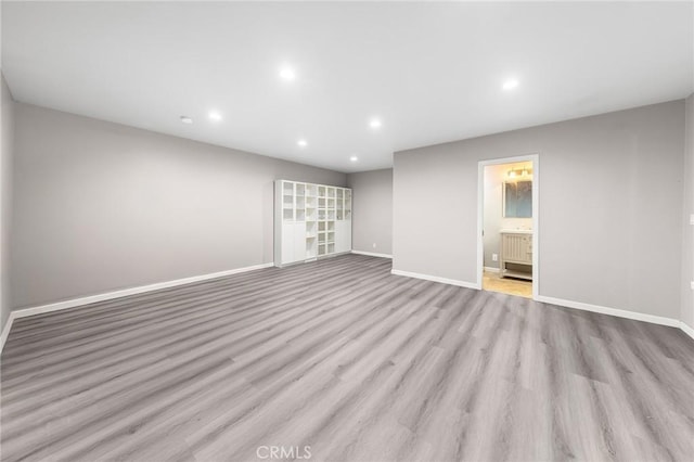 spare room featuring light wood-type flooring