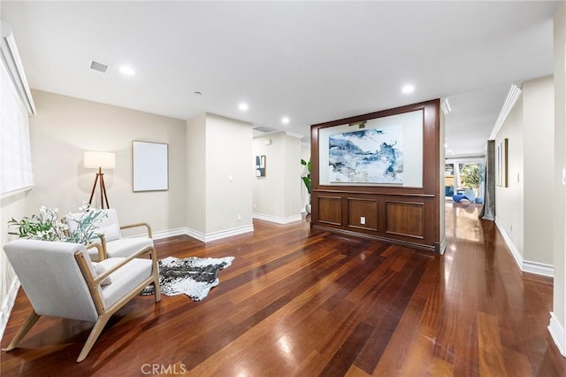 living area with dark hardwood / wood-style flooring