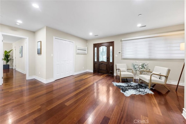 entryway with dark wood-type flooring