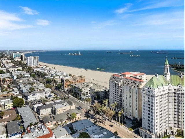 bird's eye view with a beach view and a water view