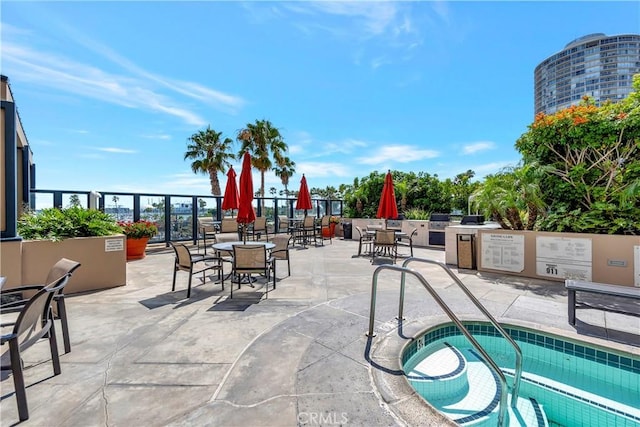 view of patio / terrace featuring exterior kitchen