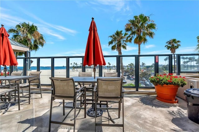 view of patio / terrace featuring a water view