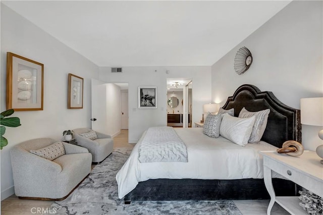 bedroom featuring light wood-type flooring