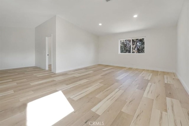 empty room with light wood-type flooring