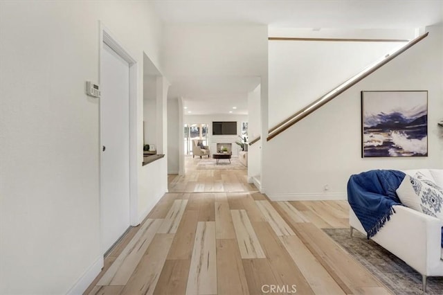 hallway featuring light wood-type flooring