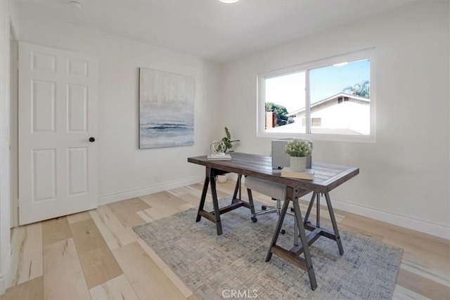 office space featuring light wood-type flooring