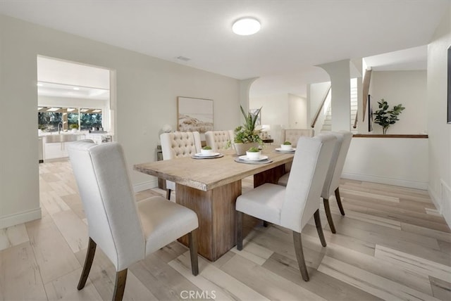 dining room featuring light hardwood / wood-style flooring