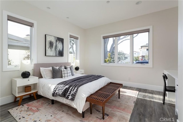 bedroom with wood-type flooring