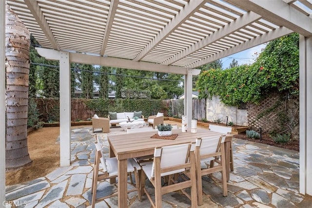 view of patio with an outdoor living space and a pergola