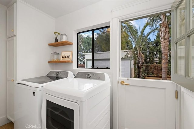 laundry room featuring washer and clothes dryer