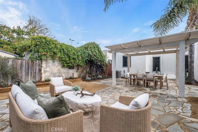 view of patio with a pergola, central AC, and an outdoor living space