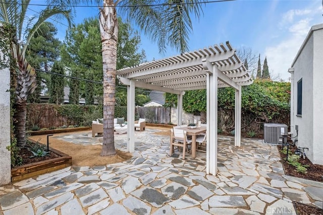 view of patio / terrace with central AC unit and a pergola