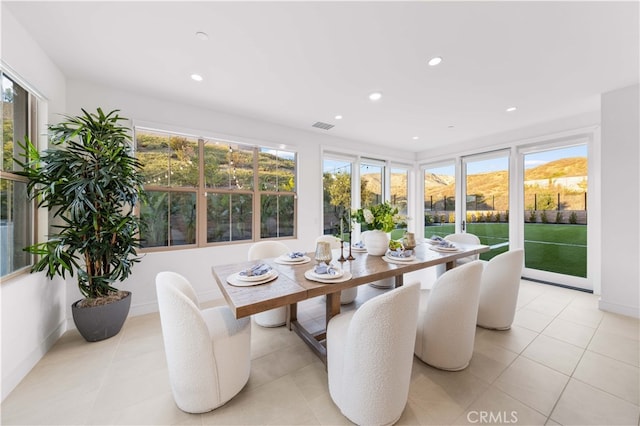 sunroom with a mountain view