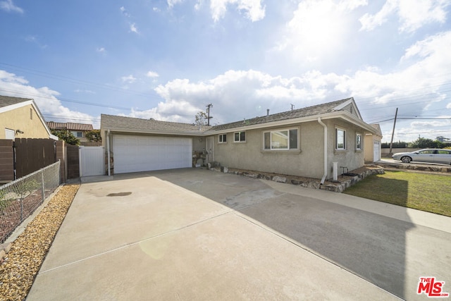 single story home with a garage