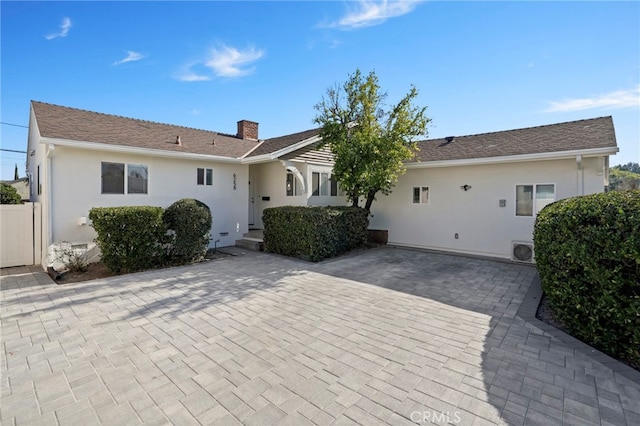 back of house featuring a patio area