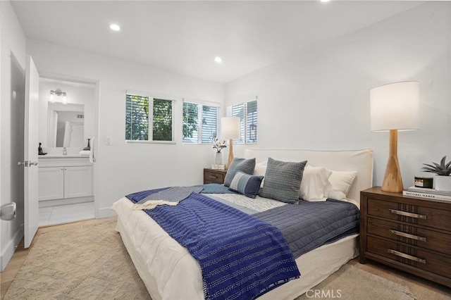 bedroom featuring connected bathroom