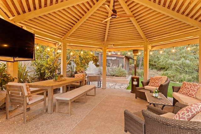 view of patio with a gazebo, outdoor lounge area, and ceiling fan