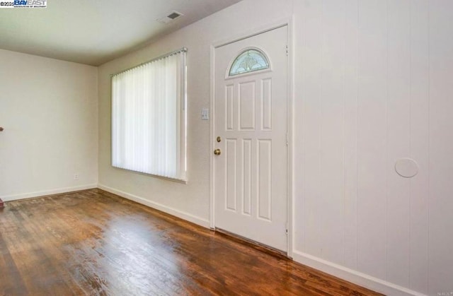 foyer with dark hardwood / wood-style flooring