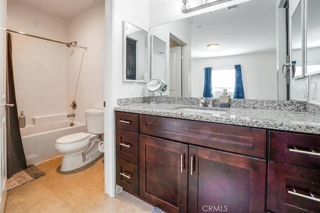 full bathroom with toilet, vanity, and  shower combination