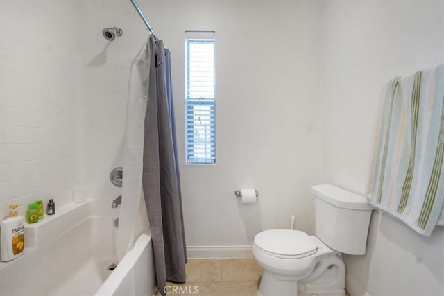 bathroom with toilet, tile patterned flooring, and shower / bathtub combination with curtain