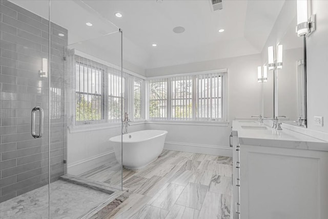 bathroom with vanity and plus walk in shower