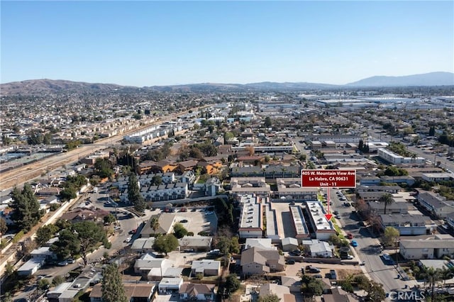 drone / aerial view featuring a mountain view