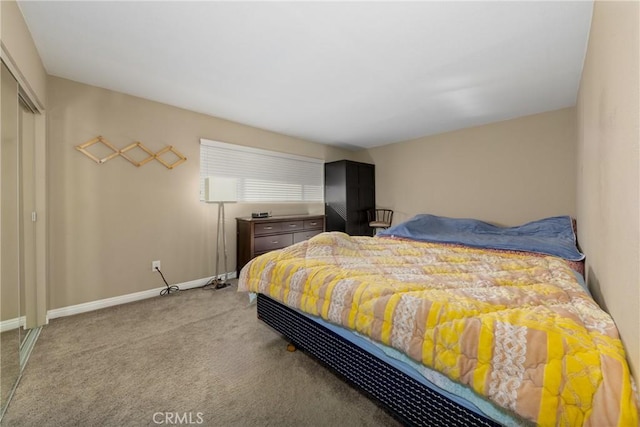 carpeted bedroom featuring a closet