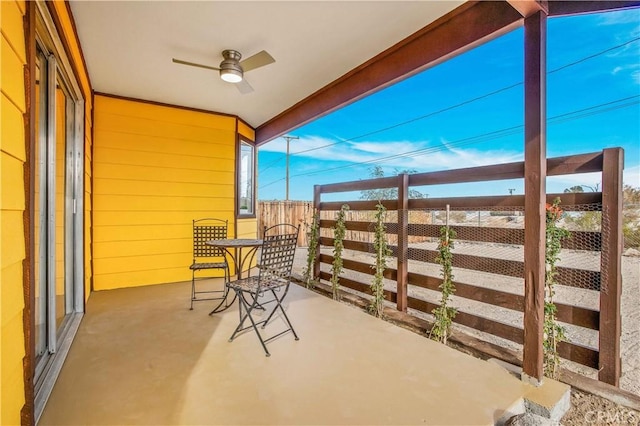 view of patio / terrace featuring ceiling fan