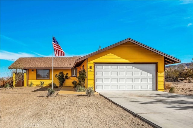 single story home with a garage