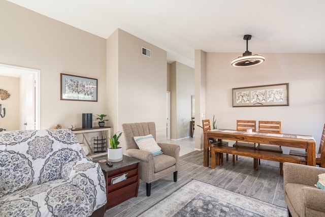 living room with vaulted ceiling