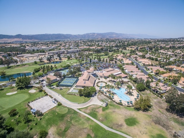 bird's eye view with a water and mountain view