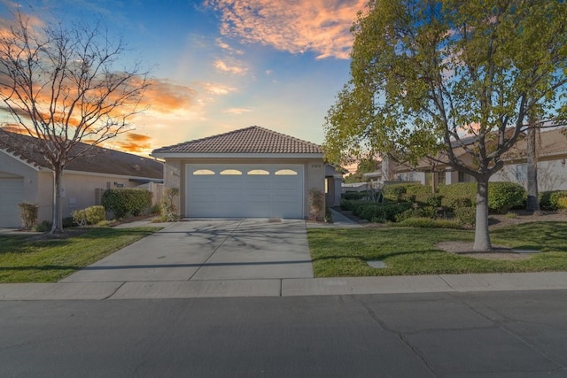 view of front of home with a yard