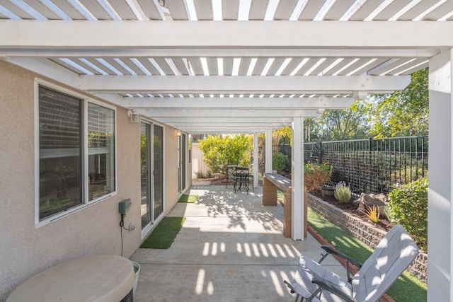 view of patio featuring a pergola