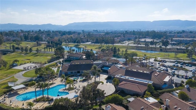 bird's eye view with a water and mountain view