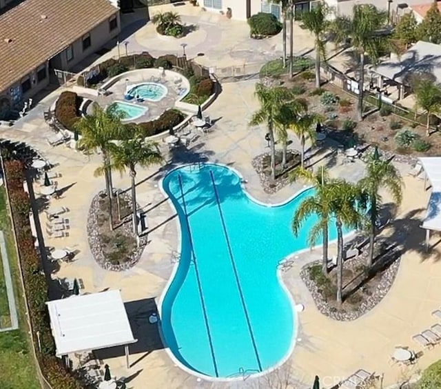 view of swimming pool with a patio area