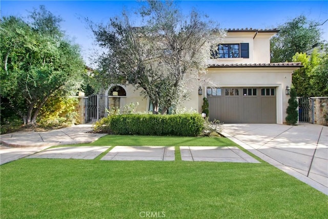 mediterranean / spanish-style house with a front lawn and a garage