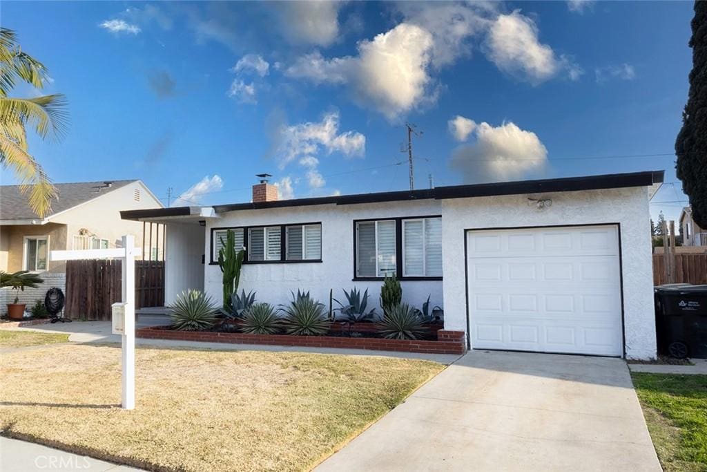 single story home with a garage