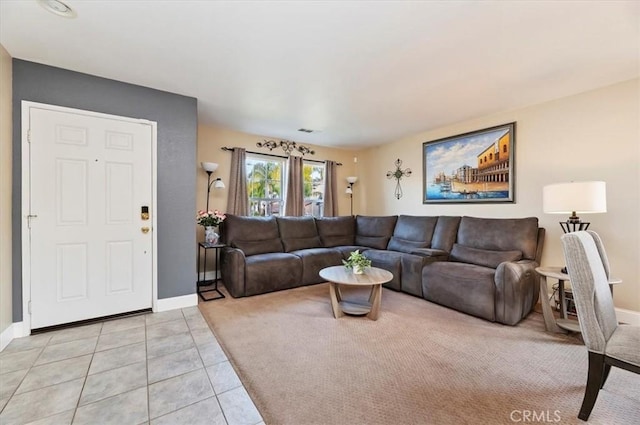 living room with light tile patterned floors