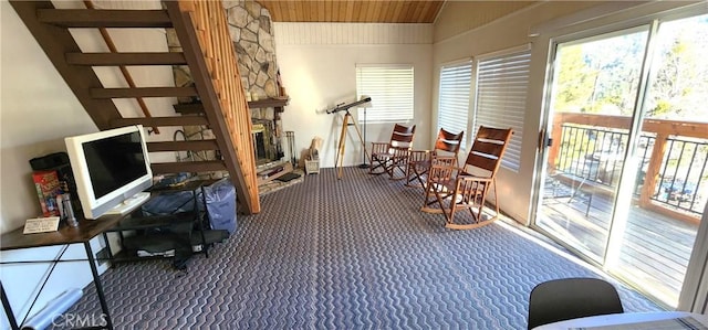 interior space featuring wooden ceiling and lofted ceiling