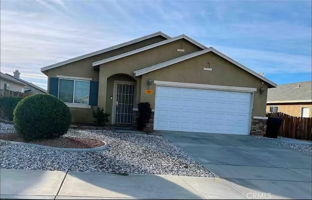 single story home with a garage