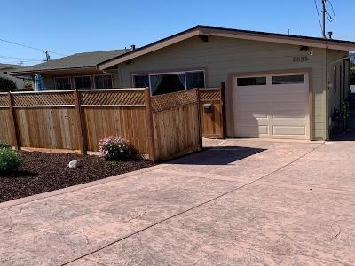 view of side of home featuring a garage