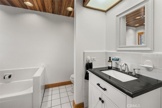 bathroom featuring toilet, wooden ceiling, tile patterned floors, a bath, and vanity