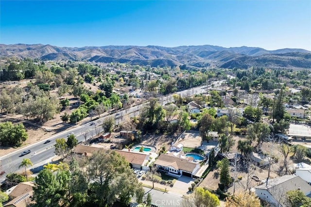 bird's eye view with a mountain view