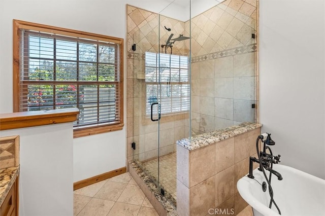 bathroom featuring shower with separate bathtub and tile patterned floors