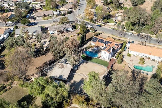birds eye view of property with a residential view