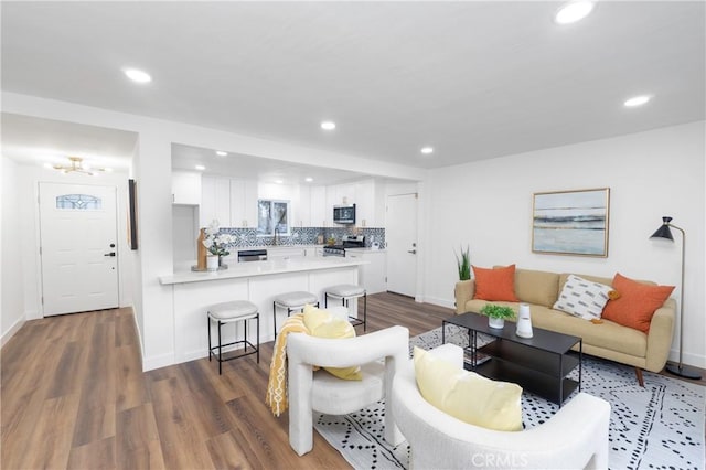 living room with dark hardwood / wood-style floors