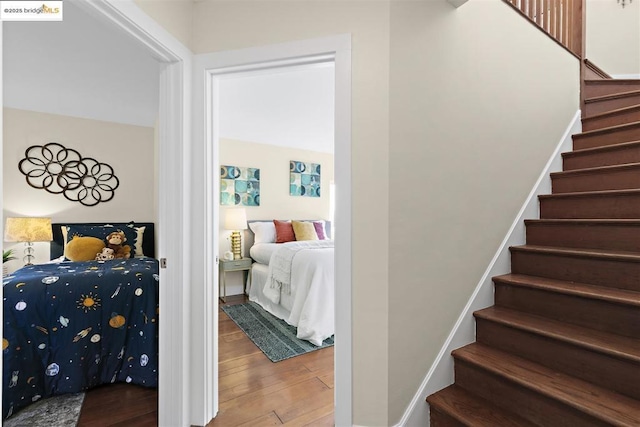 bedroom with hardwood / wood-style flooring