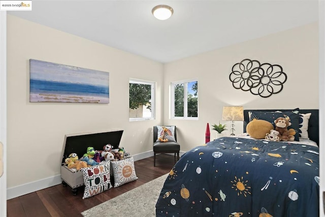 bedroom featuring dark hardwood / wood-style flooring