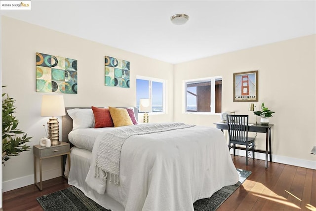 bedroom featuring dark hardwood / wood-style floors