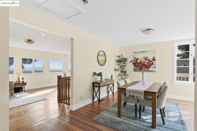 dining area with dark wood-type flooring